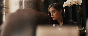 Movie still from “The Girlfriend Experience” (2009), directed by Steven Soderbergh – A woman sitting in front of an older man; Close Up shot, Over the shoulder angle