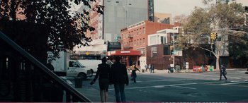 Movie still from “The Girlfriend Experience” (2009), directed by Steven Soderbergh – Two people walking down a street in a city; Wide shot, Over the shoulder angle