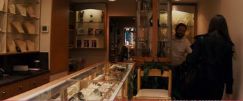 Movie still from “The Girlfriend Experience” (2009), directed by Steven Soderbergh – A view of a bakery from the inside of the store; Wide shot, High angle