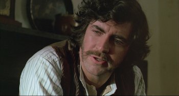 Movie still from “The Go-Between” (1971), directed by Joseph Losey – A person with a mustache; Close Up shot, Low angle