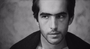 Movie still from “The Gospel According to St. Matthew” (1964), directed by Pier Paolo Pasolini – Black and white photograph of a man with a beard; Close Up shot, Low angle