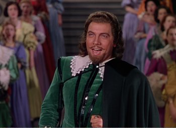 Movie still from “The Great Caruso” (1951), directed by Richard Thorpe – A person wearing a costume; Medium shot, Low angle