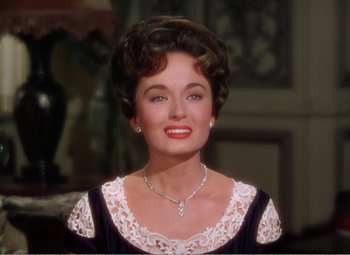 Movie still from “The Great Caruso” (1951), directed by Richard Thorpe – A person wearing a necklace; Close Up shot, High angle