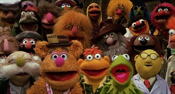 Movie still from “The Great Muppet Caper” (1981), directed by Jim Henson – A group of stuffed animals that are all wearing hats; Medium shot, High angle