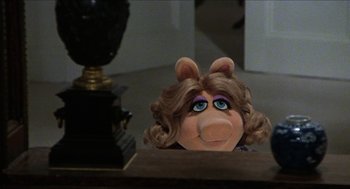 Movie still from “The Great Muppet Caper” (1981), directed by Jim Henson – The head of a muppet doll; Close Up shot, High angle