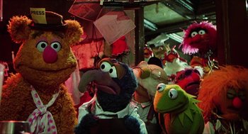 Movie still from “The Great Muppet Caper” (1981), directed by Jim Henson – A bunch of stuffed animals that are in a room together; Medium shot, High angle
