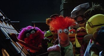 Movie still from “The Great Muppet Caper” (1981), directed by Jim Henson – A group of people dressed up as the muppets; Close Up shot, Low angle