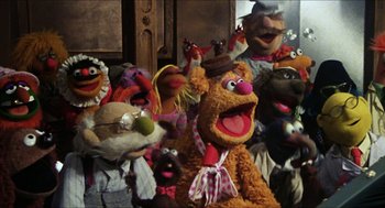 Movie still from “The Great Muppet Caper” (1981), directed by Jim Henson – A bunch of stuffed animals that are in a room together; Medium shot, High angle