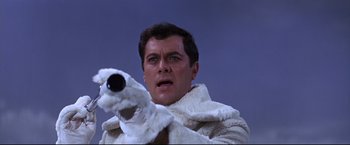 Movie still from “The Great Race” (1965), directed by Blake Edwards – A man holding a polar bear stuffed animal in his hand; Close Up shot, Low angle