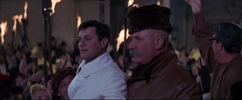 Movie still from “The Great Race” (1965), directed by Blake Edwards – Two men are standing next to each other; Medium shot, Low angle