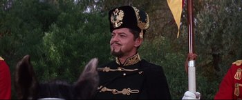 Movie still from “The Great Race” (1965), directed by Blake Edwards – A person wearing a hat; Medium shot, Low angle