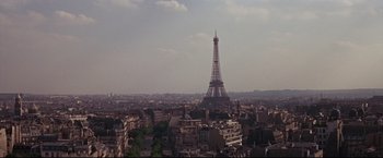 Movie still from “The Great Race” (1965), directed by Blake Edwards – A view of the eiffel tower from a high vantage point; Extreme Wide shot, Low angle