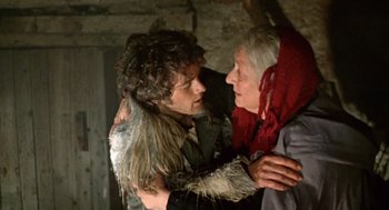 Movie still from “The Great Silence” (1968), directed by Sergio Corbucci – A man and a woman embracing each other in a room; Close Up shot, Over the shoulder angle