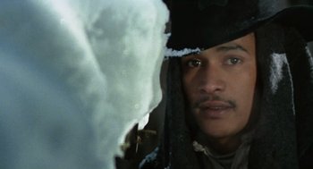 Movie still from “The Great Silence” (1968), directed by Sergio Corbucci – A person wearing a hat; Close Up shot, Low angle