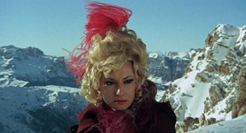 Movie still from “The Great Silence” (1968), directed by Sergio Corbucci – A woman with a red feather in her hair; Close Up shot, Low angle