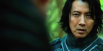 Movie still from “Altered Carbon” (2018), created by Laeta Kalogridis – A person with long black hair; Close Up shot, Over the shoulder angle