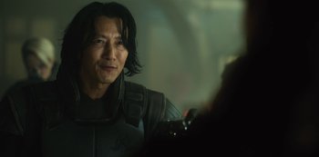 Movie still from “Altered Carbon” (2018), created by Laeta Kalogridis – A person with long black hair; Close Up shot, Over the shoulder angle