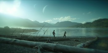 Movie still from “Altered Carbon” (2018), created by Laeta Kalogridis – Two people walking along the shore of a body of water; Extreme Wide shot, Low angle