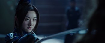 Movie still from “The Great Wall” (2016), directed by Yimou Zhang – A person holding a sword; Close Up shot, Over the shoulder angle