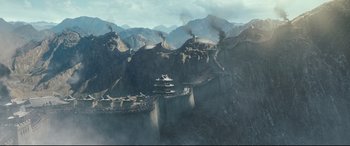 Movie still from “The Great Wall” (2016), directed by Yimou Zhang – An aerial view of a castle on top of a mountain; Extreme Wide shot, High angle