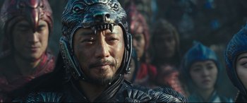 Movie still from “The Great Wall” (2016), directed by Yimou Zhang – A person wearing a helmet; Close Up shot, Over the shoulder angle
