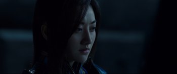 Movie still from “The Great Wall” (2016), directed by Yimou Zhang – A person wearing a blue shirt; Close Up shot, Over the shoulder angle