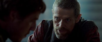 Movie still from “The Great Wall” (2016), directed by Yimou Zhang – A person with a beard; Close Up shot, Over the shoulder angle