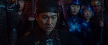Movie still from “The Great Wall” (2016), directed by Yimou Zhang – A man wearing a black hat and a black jacket; Close Up shot, Over the shoulder angle