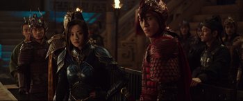 Movie still from “The Great Wall” (2016), directed by Yimou Zhang – A man and a woman standing next to each other; Medium shot, Over the shoulder angle