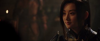 Movie still from “The Great Wall” (2016), directed by Yimou Zhang – A person wearing a costume; Close Up shot, Over the shoulder angle