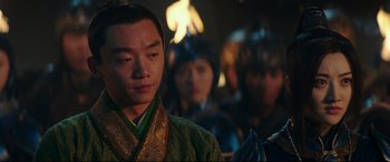 Movie still from “The Great Wall” (2016), directed by Yimou Zhang – A group of people standing in a room; Close Up shot, Over the shoulder angle