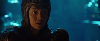 Movie still from “The Great Wall” (2016), directed by Yimou Zhang – A man wearing a helmet and armor looking at the camera; Close Up shot, Low angle