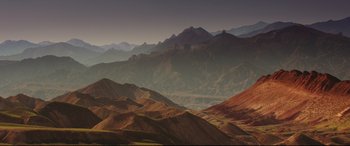 Movie still from “The Great Wall” (2016), directed by Yimou Zhang – A view of a mountain range from a distance; Extreme Wide shot, High angle