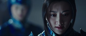 Movie still from “The Great Wall” (2016), directed by Yimou Zhang – A person wearing a blue shirt; Close Up shot, Over the shoulder angle
