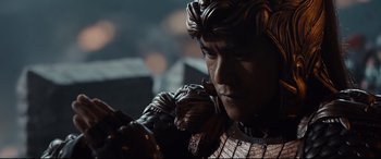 Movie still from “The Great Wall” (2016), directed by Yimou Zhang – A statue of a man with a sword; Close Up shot, Low angle