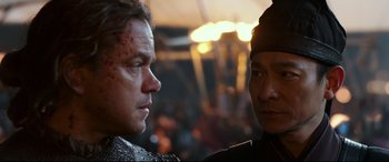 Movie still from “The Great Wall” (2016), directed by Yimou Zhang – A man and a woman standing next to each other; Close Up shot, Over the shoulder angle