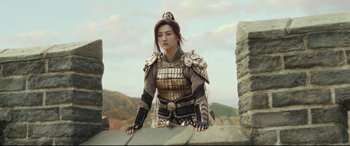 Movie still from “The Great Wall” (2016), directed by Yimou Zhang – A woman dressed as a chinese warrior in armor; Medium shot, Low angle