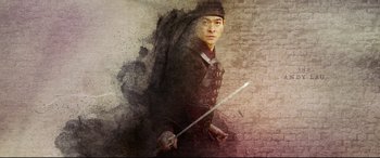 Movie still from “The Great Wall” (2016), directed by Yimou Zhang – A man holding a sword in his hands; Medium shot, Low angle