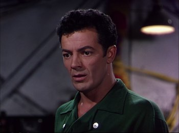 Movie still from “The Greatest Show on Earth” (1952), directed by Cecil B. DeMille – A person wearing a green shirt; Close Up shot, Low angle