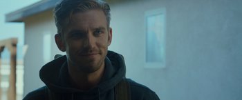 Movie still from “The Guest” (2014), directed by Adam Wingard – A person wearing a hoodie; Close Up shot, Over the shoulder angle