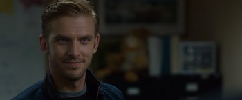 Movie still from “The Guest” (2014), directed by Adam Wingard – A person with blond hair and blue eyes; Close Up shot, Over the shoulder angle