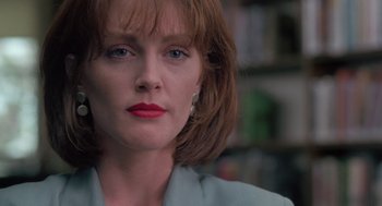 Movie still from “The Hand That Rocks the Cradle” (1992), directed by Curtis Hanson – A person wearing a jacket; Close Up shot, Low angle