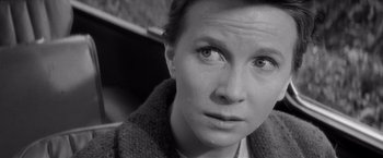Movie still from “The Haunting” (1963), directed by Robert Wise – A black - and - white photo of a woman looking at the camera; Close Up shot, High angle