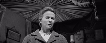 Movie still from “The Haunting” (1963), directed by Robert Wise – A black - and - white photo of a woman in a coat; Close Up shot, Low angle