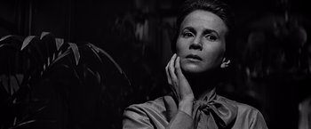 Movie still from “The Haunting” (1963), directed by Robert Wise – Black and white photograph of a woman looking at the camera; Close Up shot, Low angle