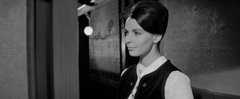 Movie still from “The Haunting” (1963), directed by Robert Wise – A black and white photo of a woman in a vest; Close Up shot, Low angle