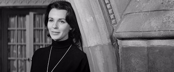 Movie still from “The Haunting” (1963), directed by Robert Wise – Black and white photograph of a woman in front of a column; Close Up shot, Low angle