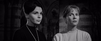 Movie still from “The Haunting” (1963), directed by Robert Wise – A black - and - white photo of two women standing next to each other; Close Up shot, Low angle