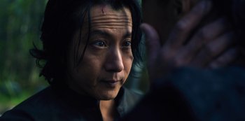 Movie still from “Altered Carbon” (2018), created by Laeta Kalogridis – A person's face in the dark; Close Up shot, Over the shoulder angle