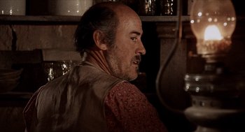 Movie still from “The Hired Hand” (1971), directed by Peter Fonda – A person with a beard; Close Up shot, Over the shoulder angle